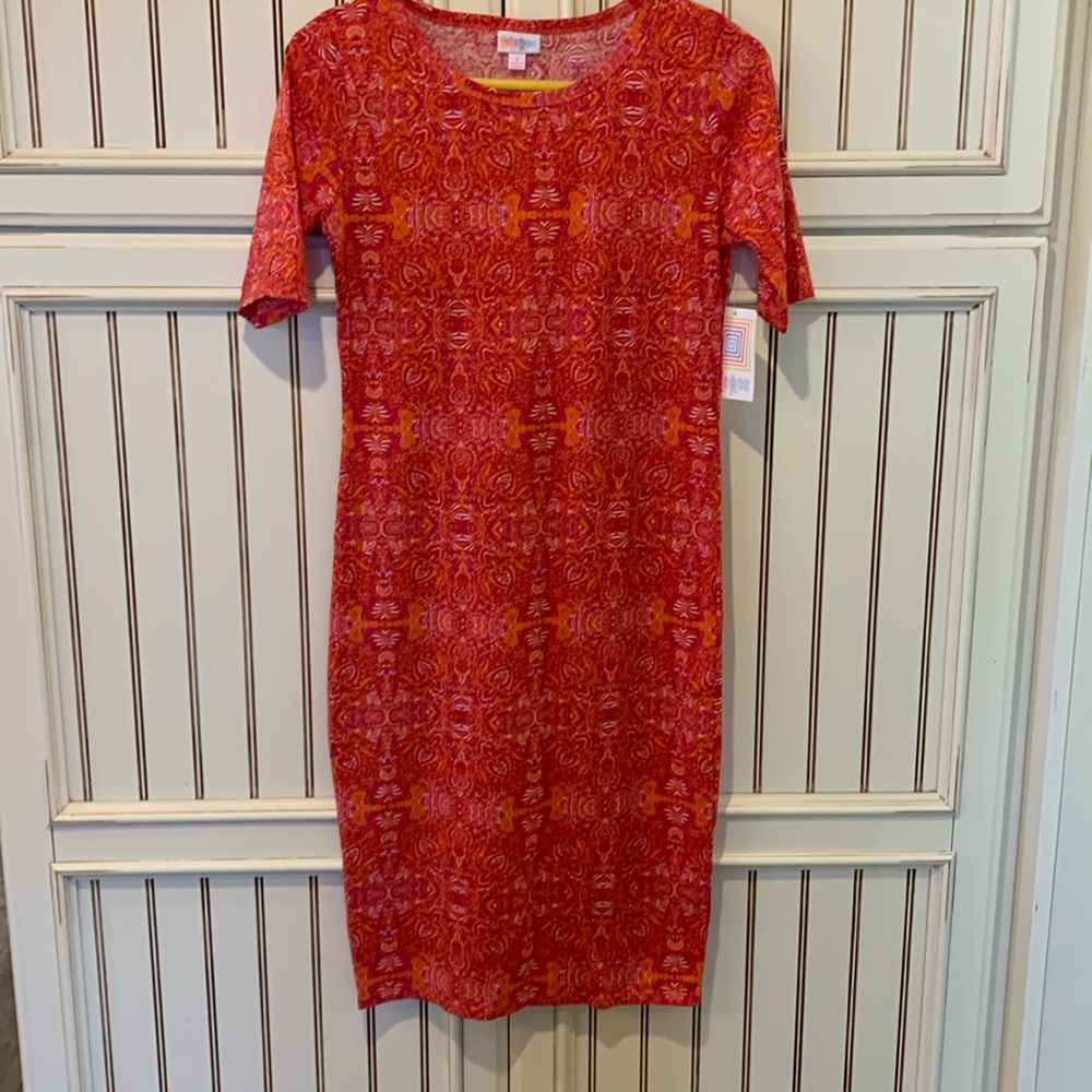 Lula Row Julia. Small.. very fitted dress, beautiful pink oranges and red..